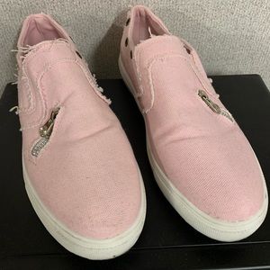 Pink stylish distressed canvas loafers.